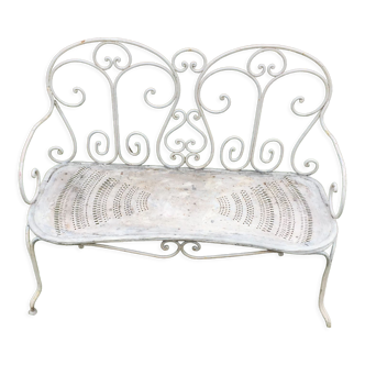 Old wrought iron garden bench. Around 1900