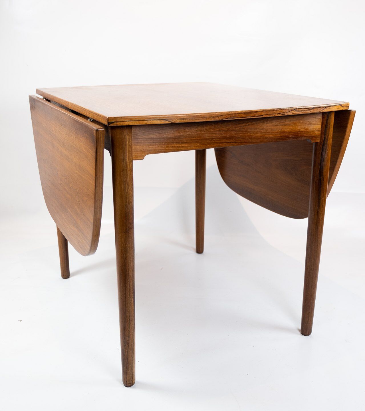 Dining table in rosewood with extentions of danish design from the 1960s