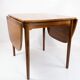 Dining table in rosewood with extentions of danish design from the 1960s