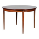 Round extendable dining table in rosewood, Rio, 1960.