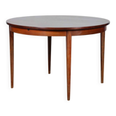 Round extendable dining table in rosewood, Rio, 1960.