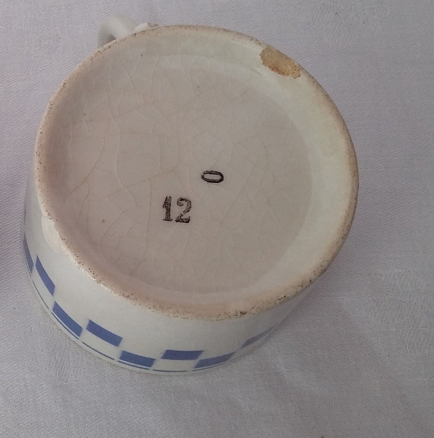 Blue checkerboard cup