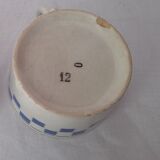 Blue checkerboard cup
