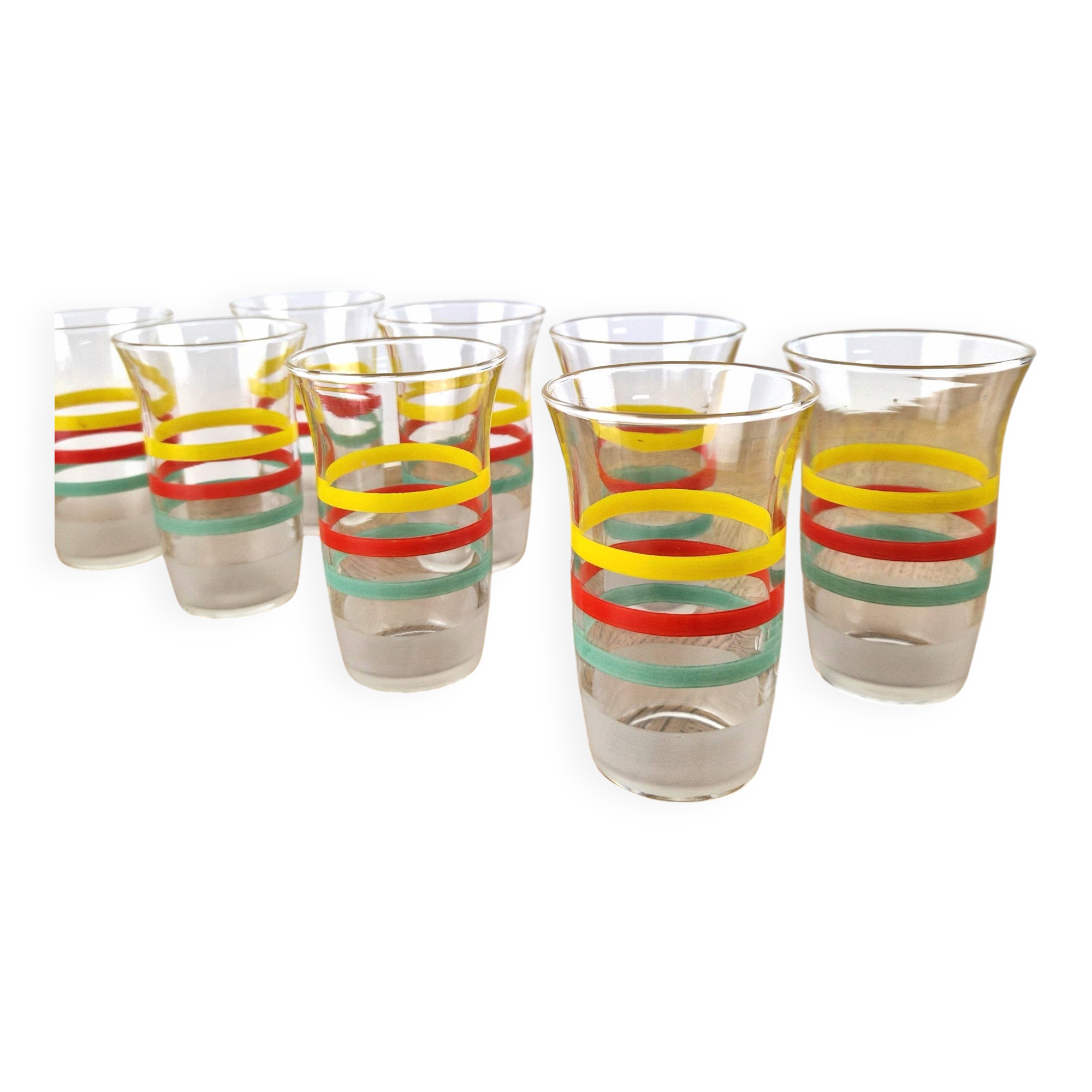 8 multicoloured vintage orangeade glasses from the 60s/70s.