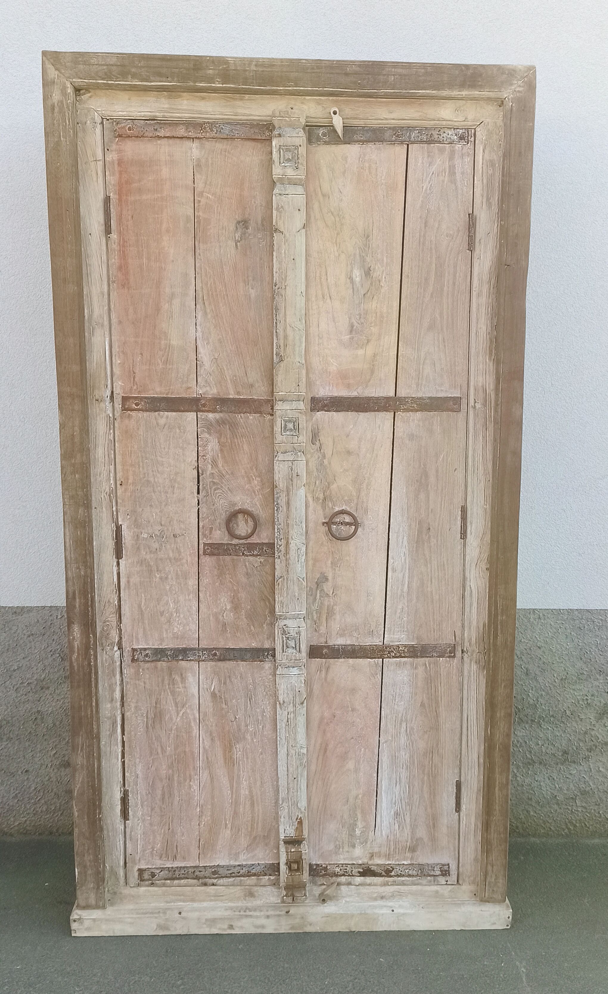 Wooden wardrobe with antique doors