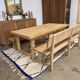 Solid oak extendable farmhouse table with 2 drawers.