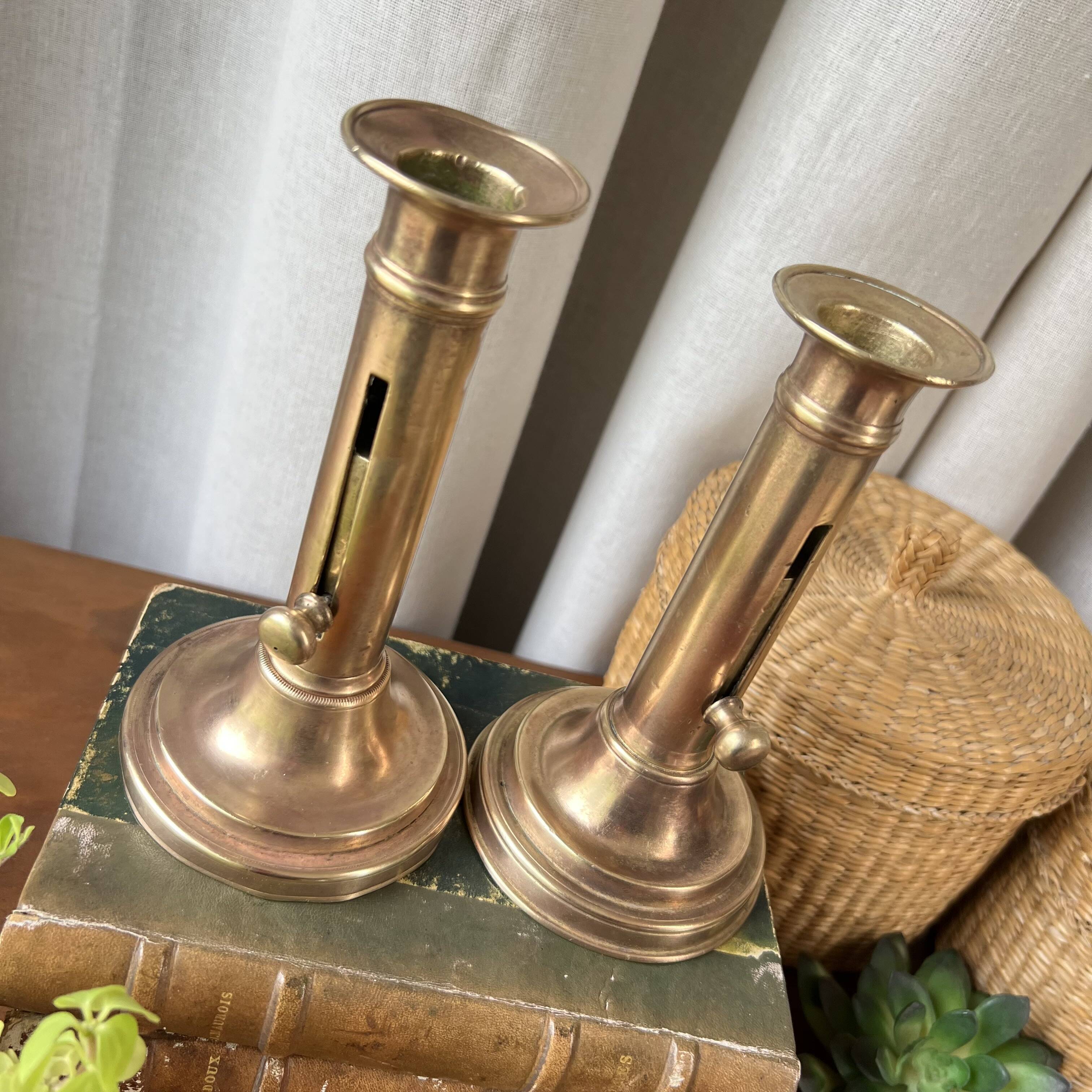 Duo of brass candlesticks