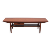 Grande table basse avec porte-revues par O.M.F., années 1960.