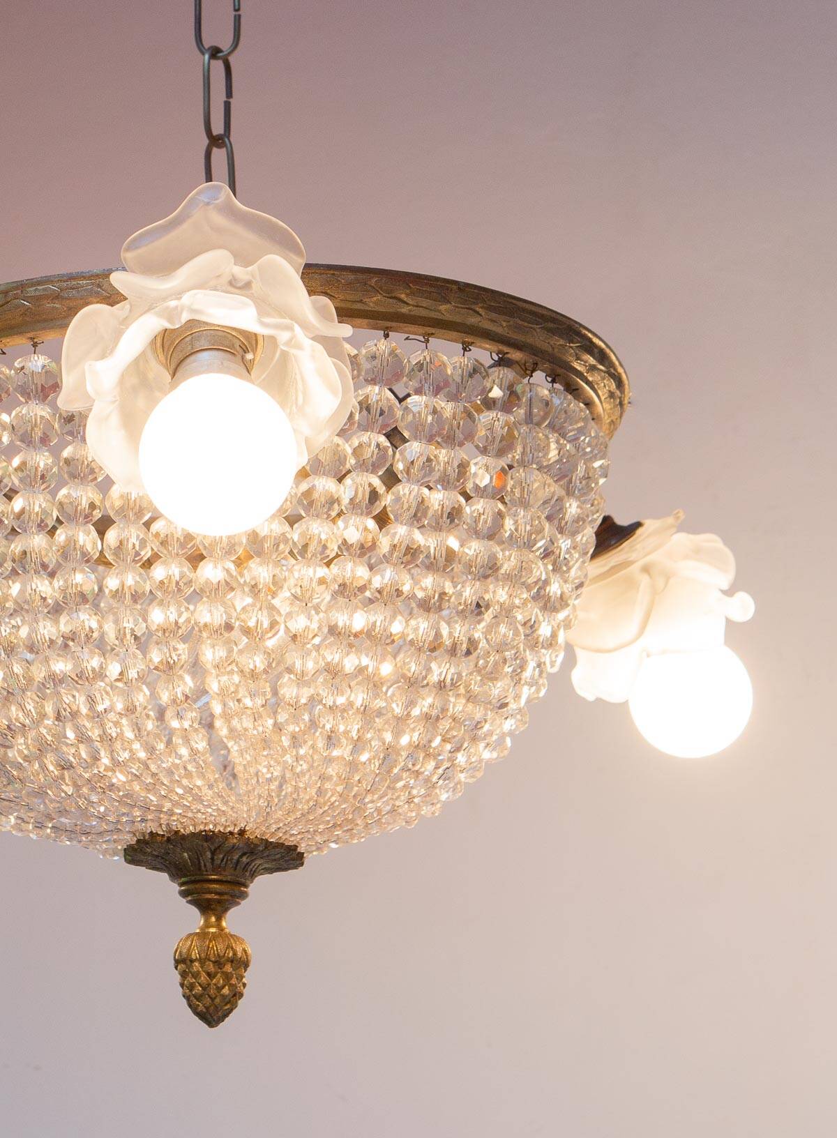 Old bronze ceiling light and 3 tulip flowers