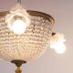 Old bronze ceiling light and 3 tulip flowers