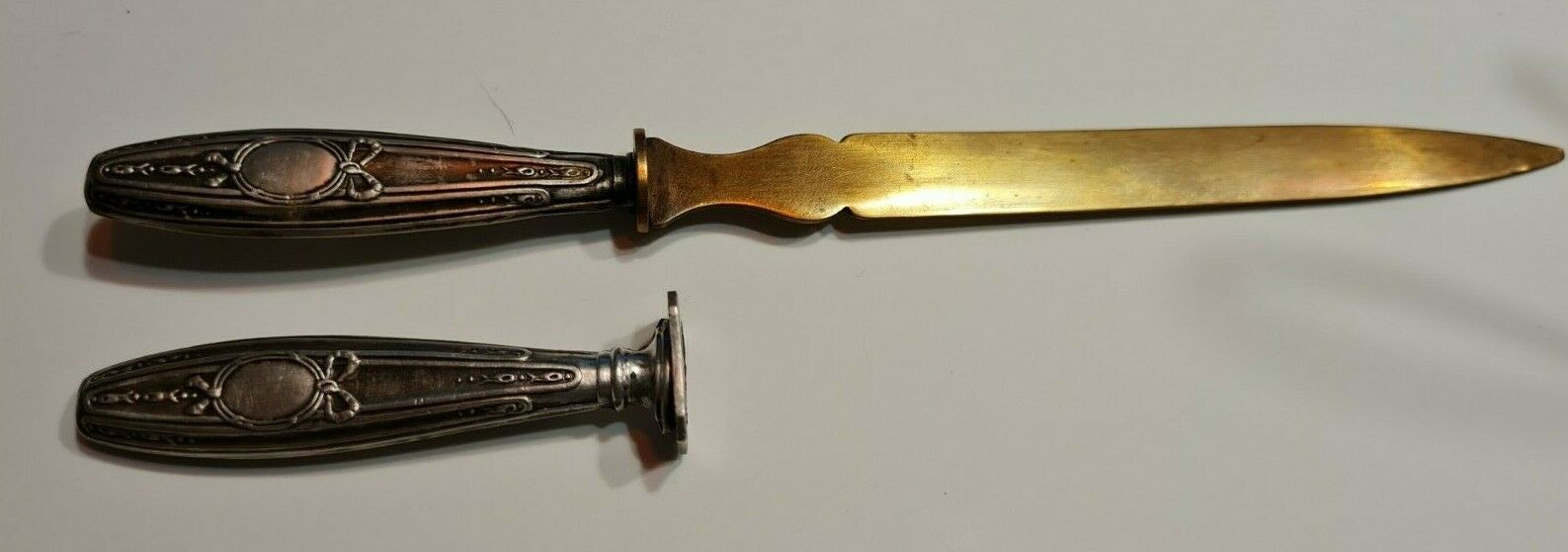 Paper cut with a stamp handle punches boar heads