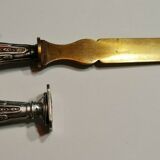 Paper cut with a stamp handle punches boar heads