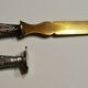 Paper cut with a stamp handle punches boar heads