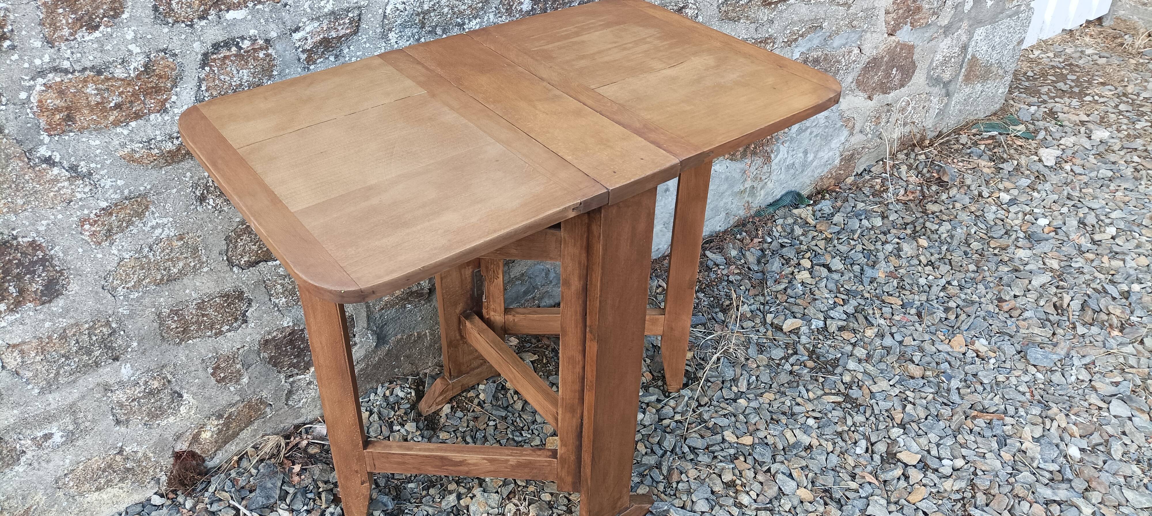 Old wooden table with double swings