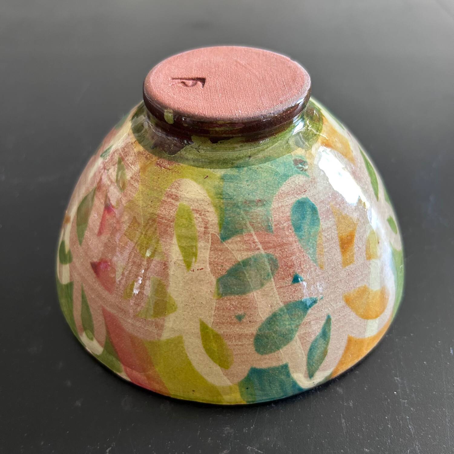 Signed bowl painted with stencil