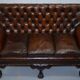 Chesterfield leather canapé in Georgian style with lion paw carved feet.