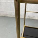 Small rolling trolley in brass and black plastic