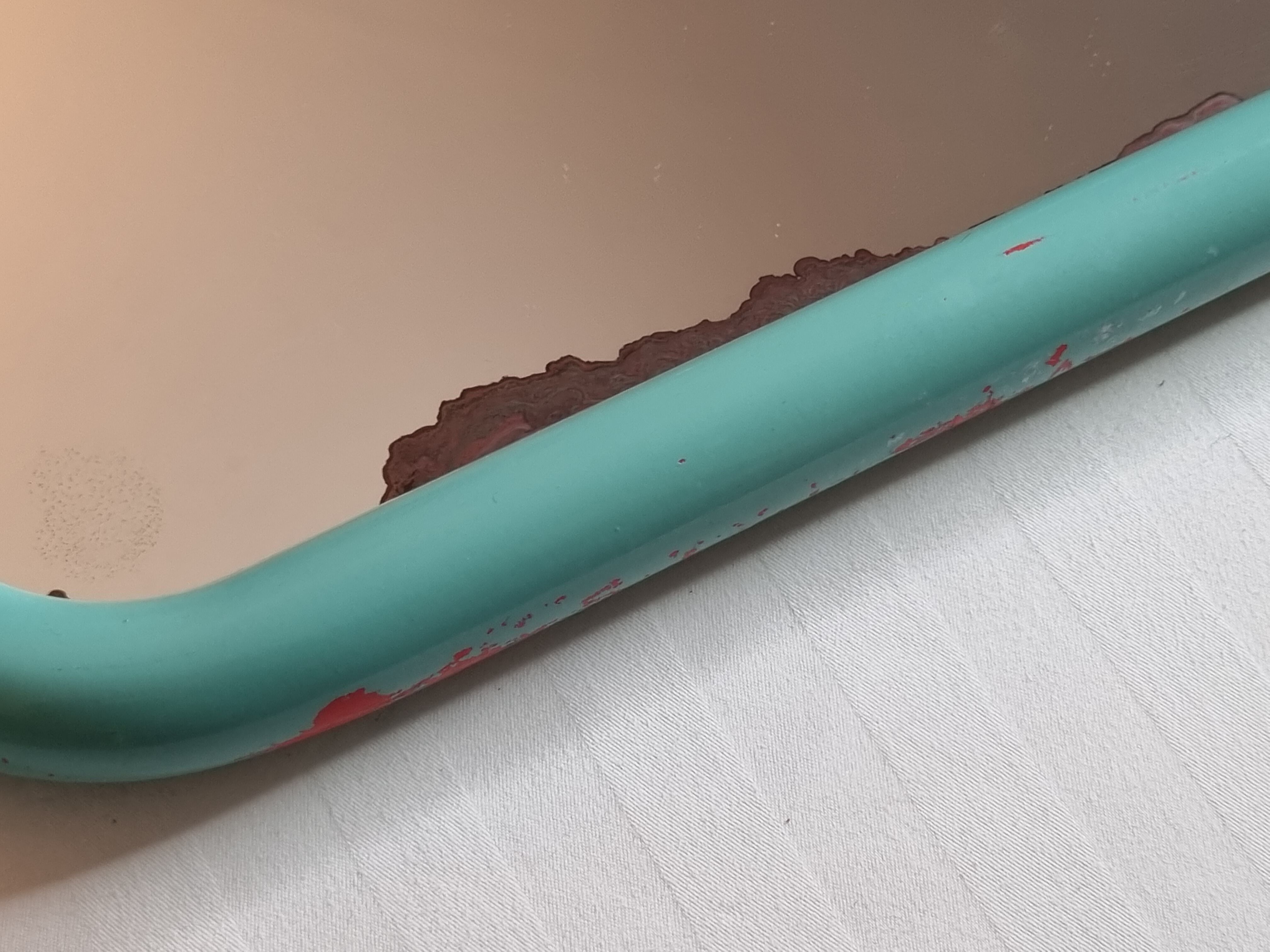 Vintage mirror in painted tubular steel of rectangular shape, 60 cm