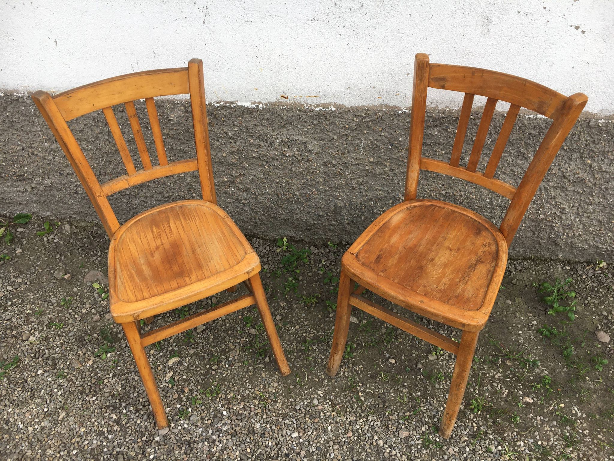 Pair of vintage curved wooden bistro chairs