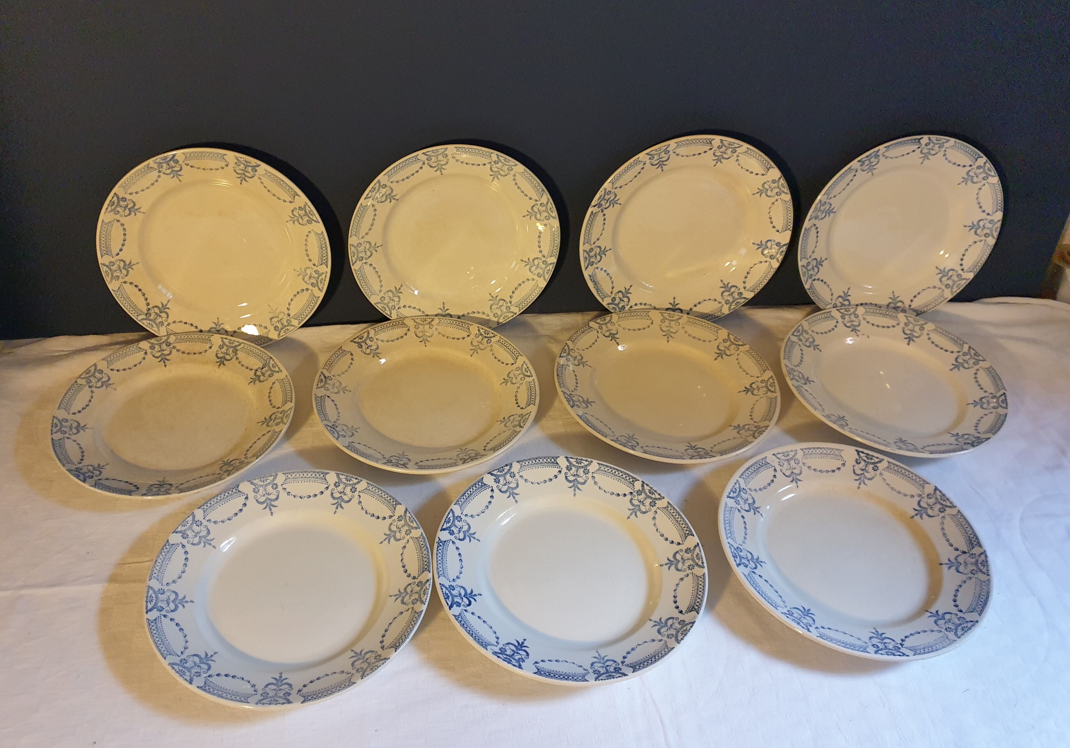 Suite of 11 flat plates iron earth