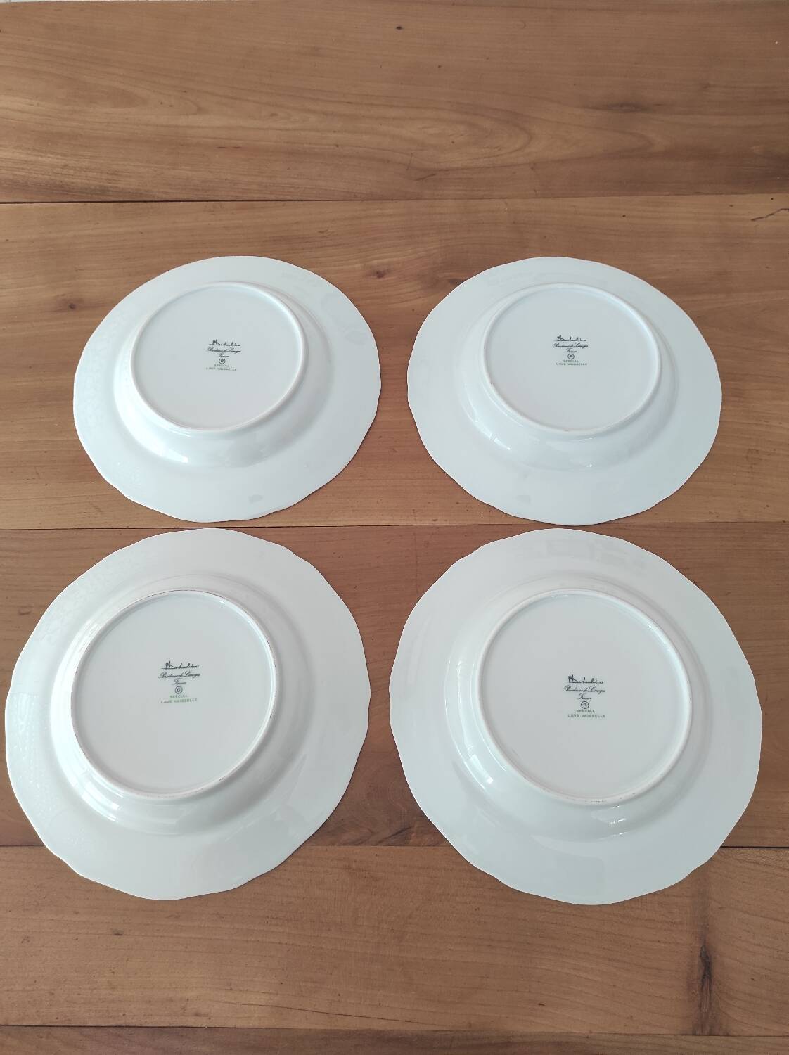 Set of 4 Limoges porcelain soup plates