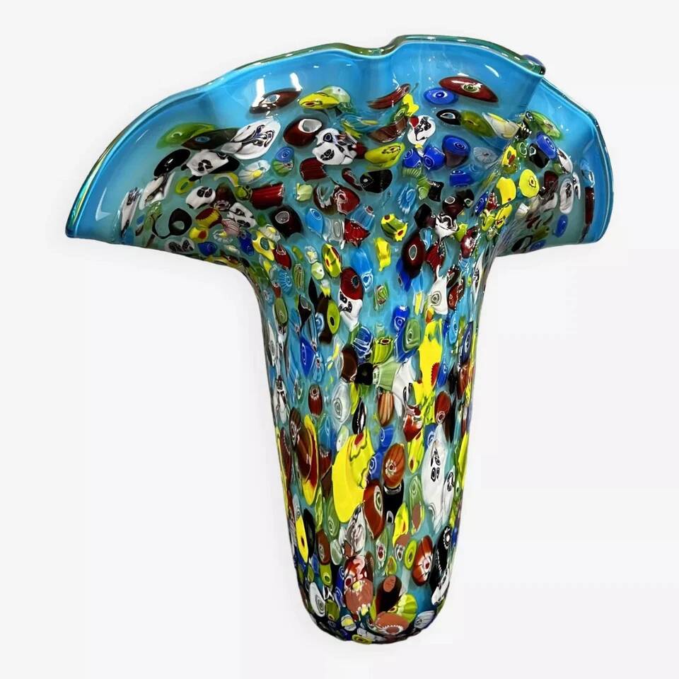 Venice circa 1980: Large "octopusy" vase in millefiori glass with a blue background
