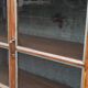 Old glass cabinet in wood and metal