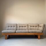 Two vintage Swedish sofas and a pine table