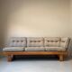 Two vintage Swedish sofas and a pine table