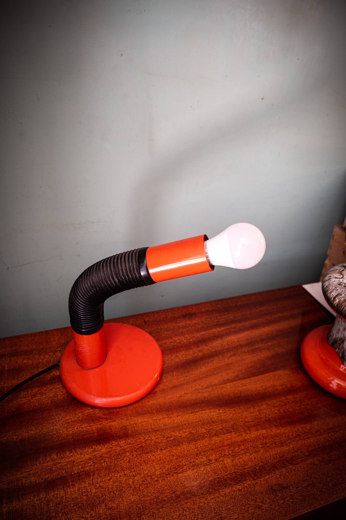 Orange Elbow table lamp by E. Bellini for Targetti Sankey, Italy, 70's