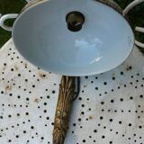 Art Nouveau wall light in bronze with a white Haviland porcelain shade.