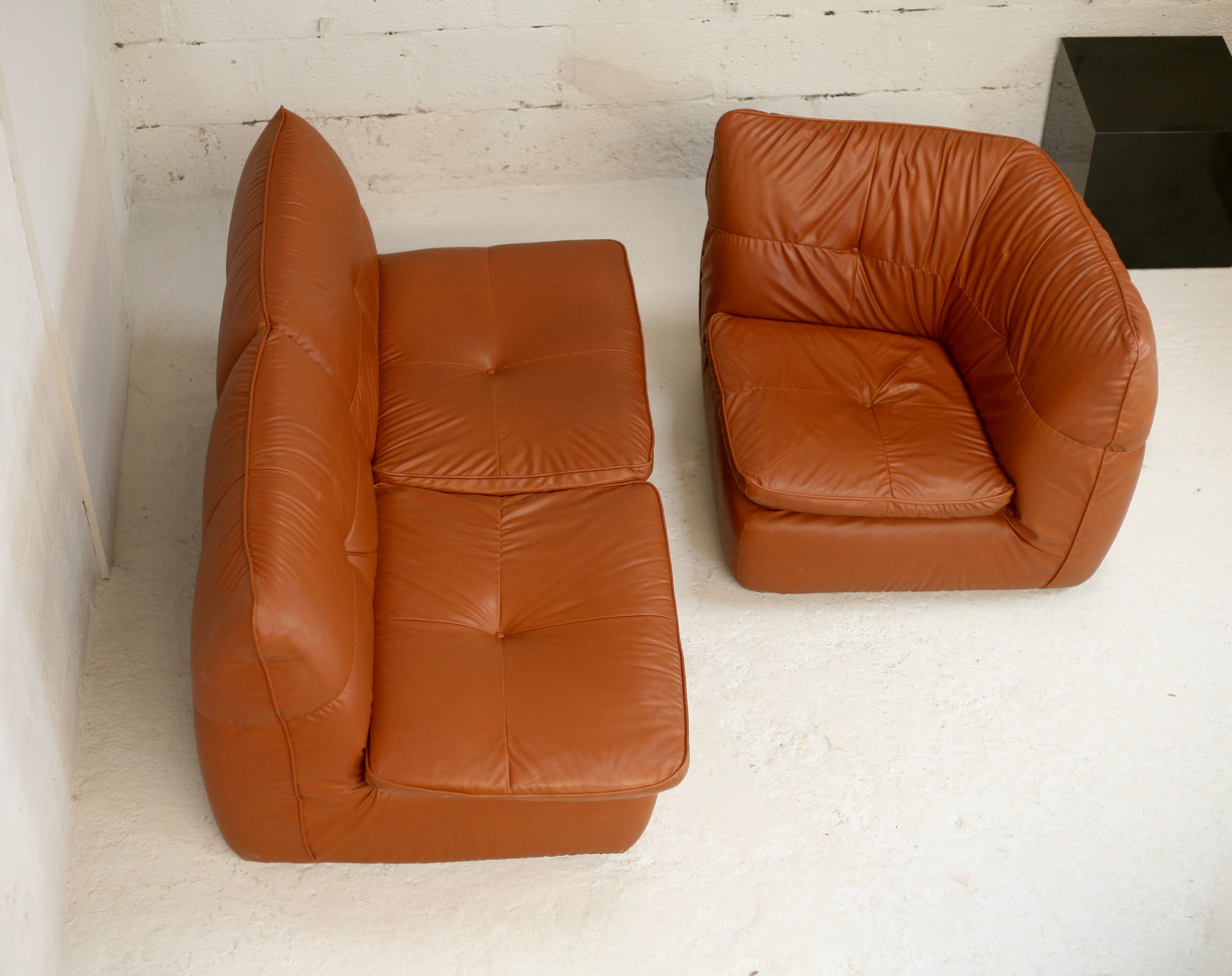 Imitation leather sofa "caramel". Convertible. France, circa 1990