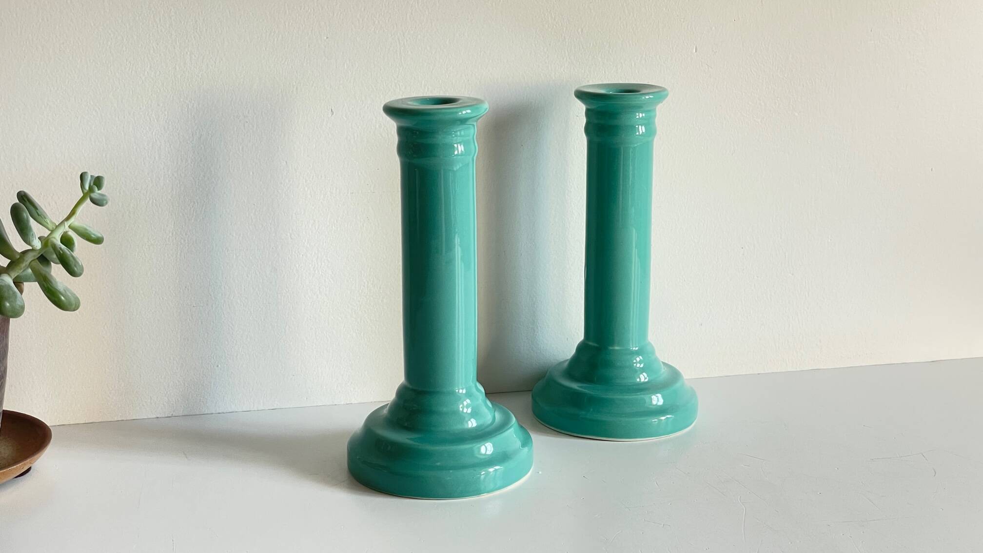 Pair of vintage ocean blue ceramic candlesticks