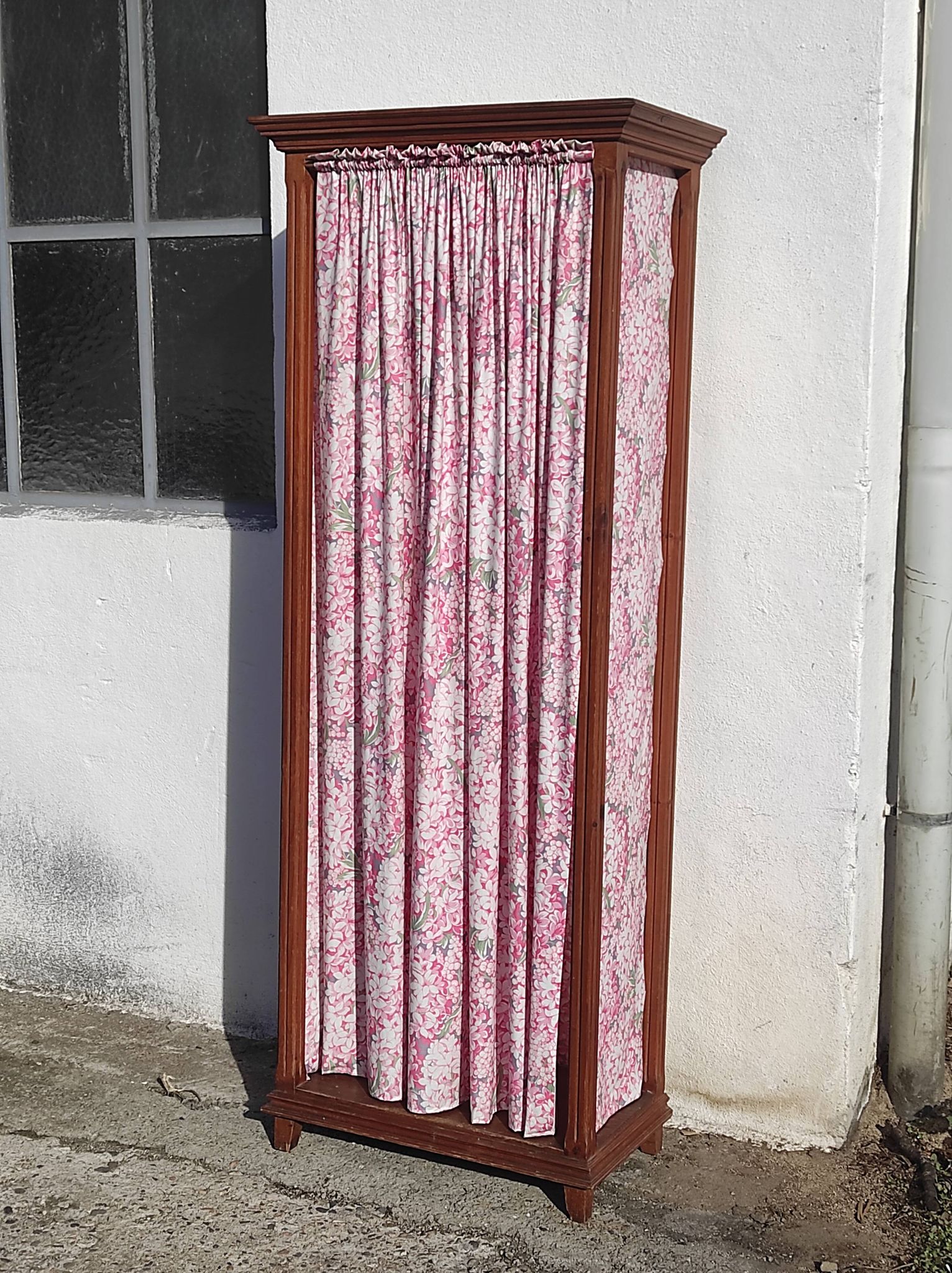 Old wardrobe in old wood and vintage fabric