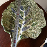 Vintage ceramic leaf-shaped vide poche, signed.