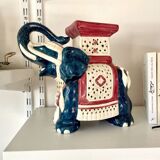 Blue and red ceramic elephant plant stand