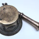 Mortier et son pilon en bronze à décor de coquille saint jacques