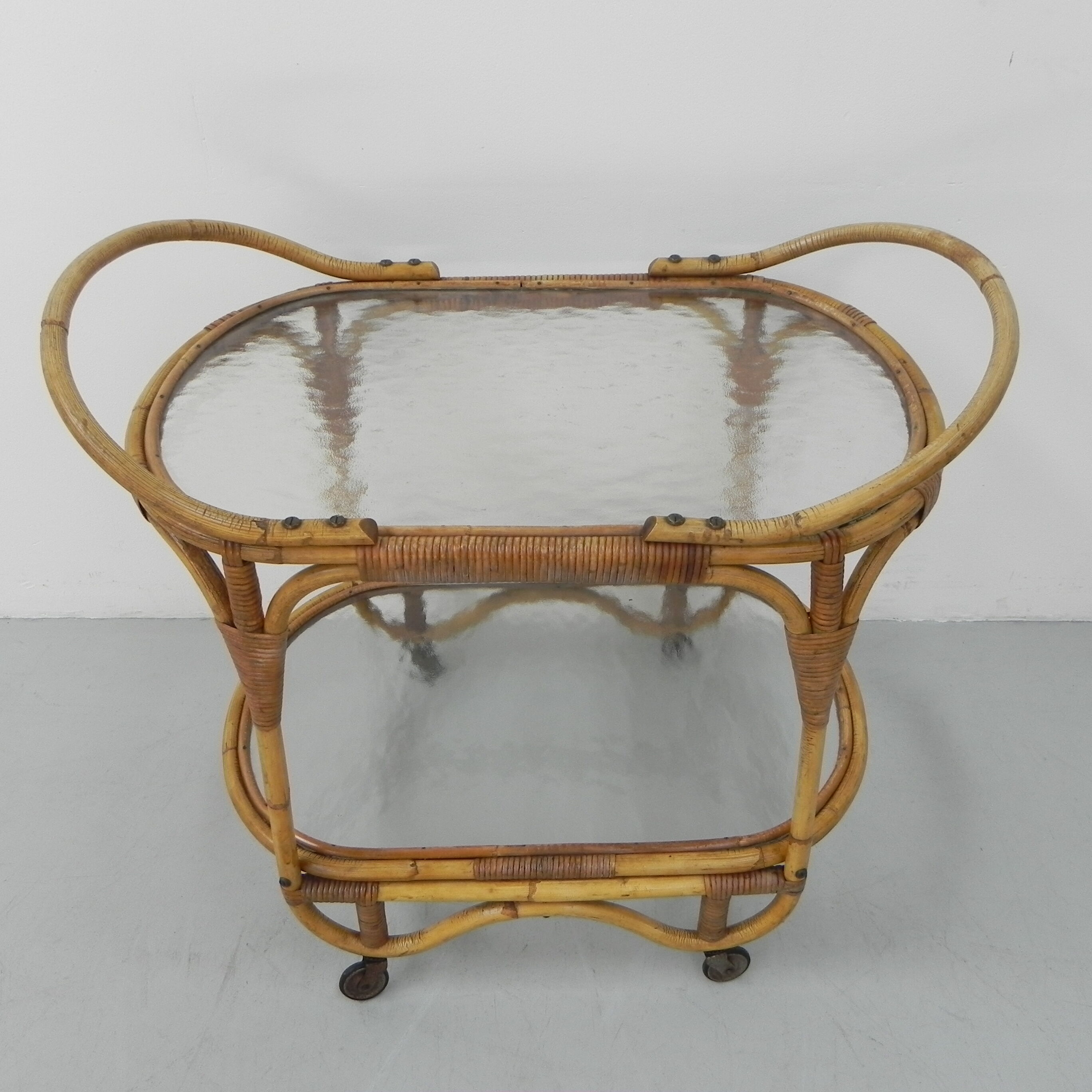 Bamboo, rattan serving trolley on castors