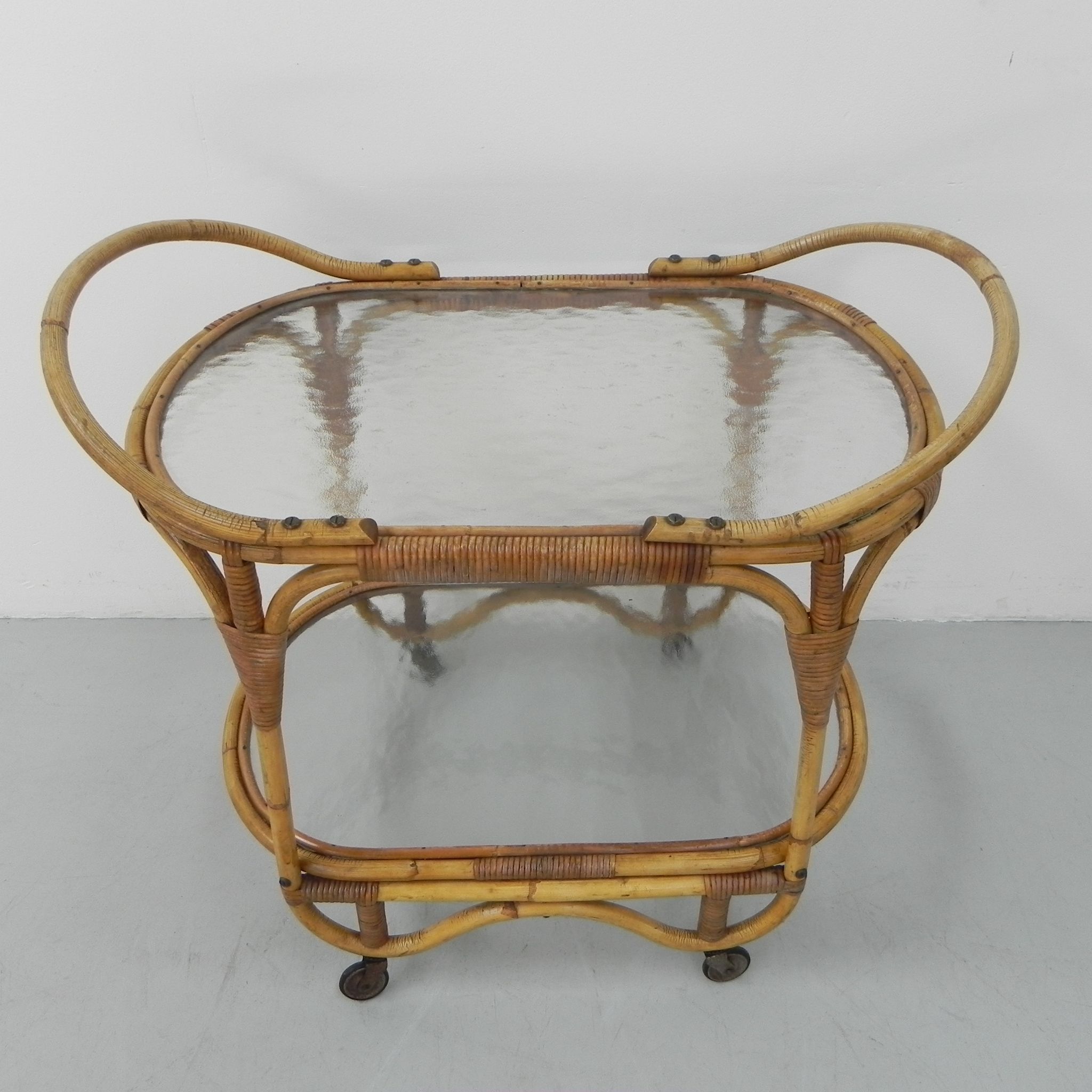 Bamboo, rattan serving trolley on castors