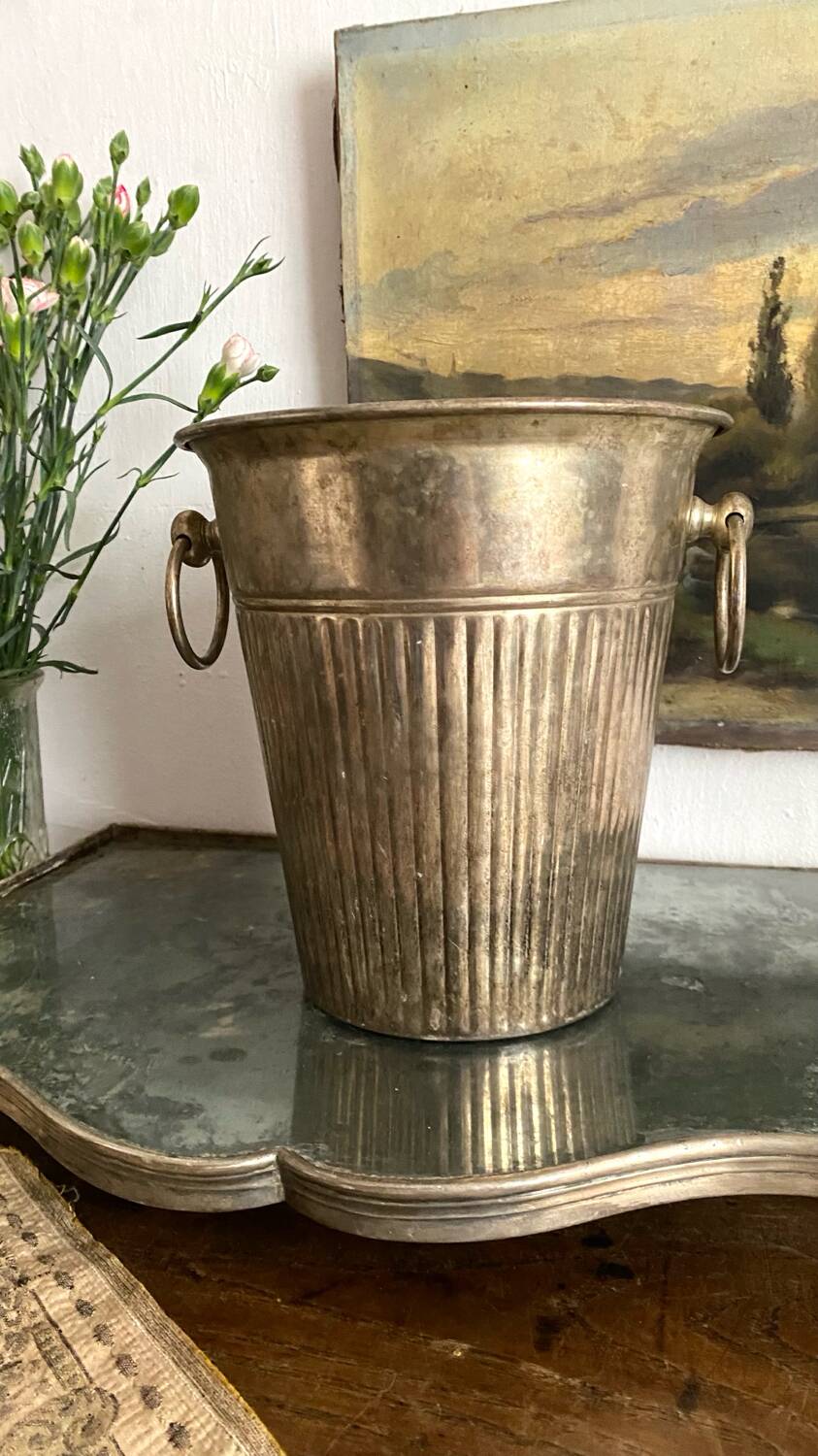 Patinated silver metal champagne bucket