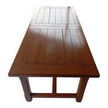 Large rectangular dining table in solid oak in a neo-rustic style.