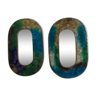 Pair of ceramic sandstone mirrors, enamel glass
