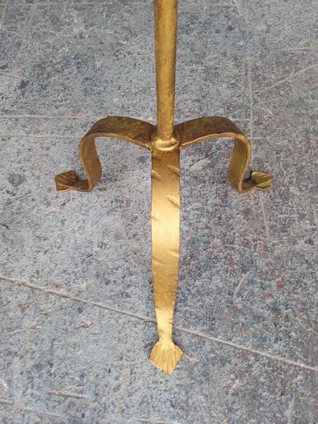 Minimalist brutalist gold metal pedestal table
