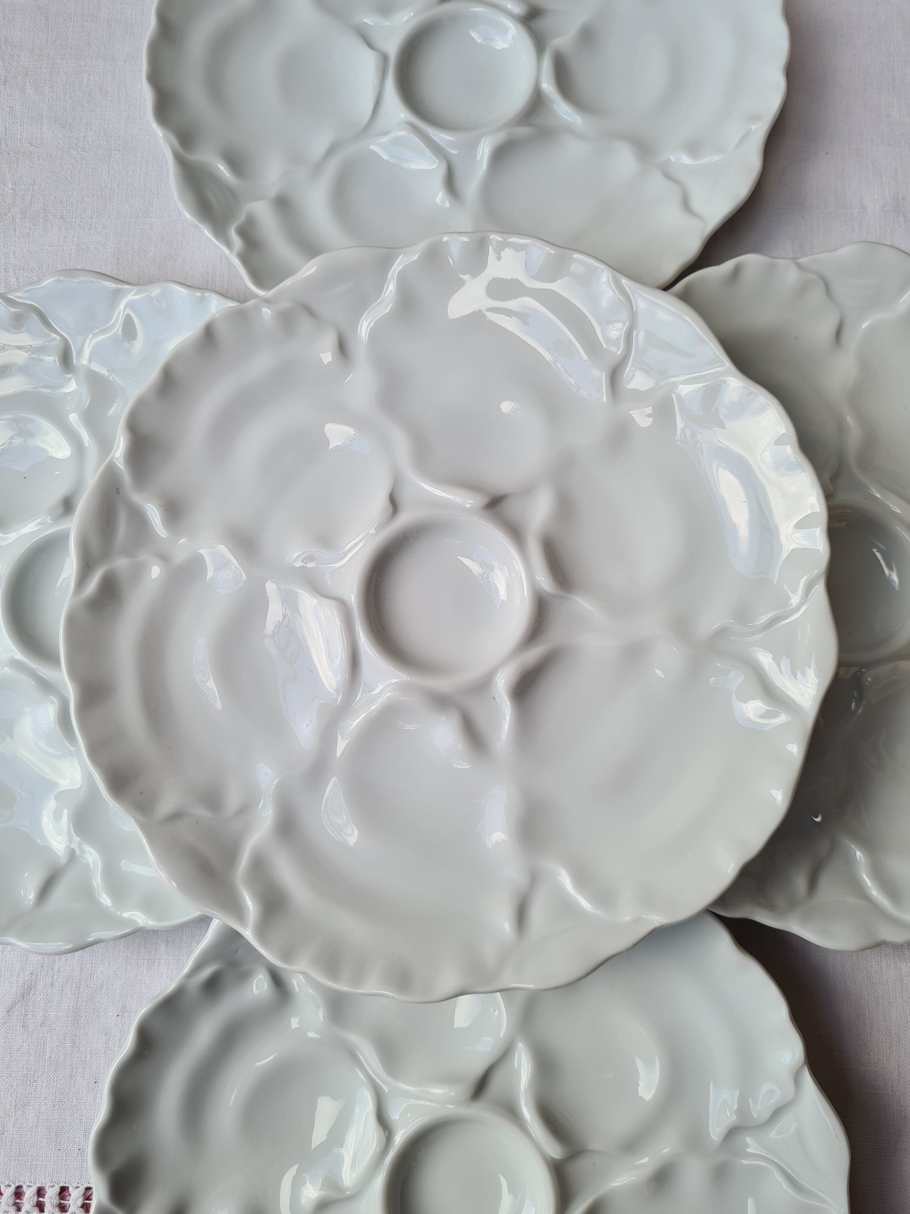 Nine Bavarian porcelain oyster plates