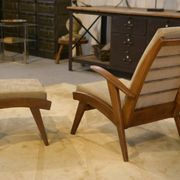 Scandinavian armchair and two 1960s ottomans.
