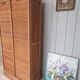 Double curtain cabinet