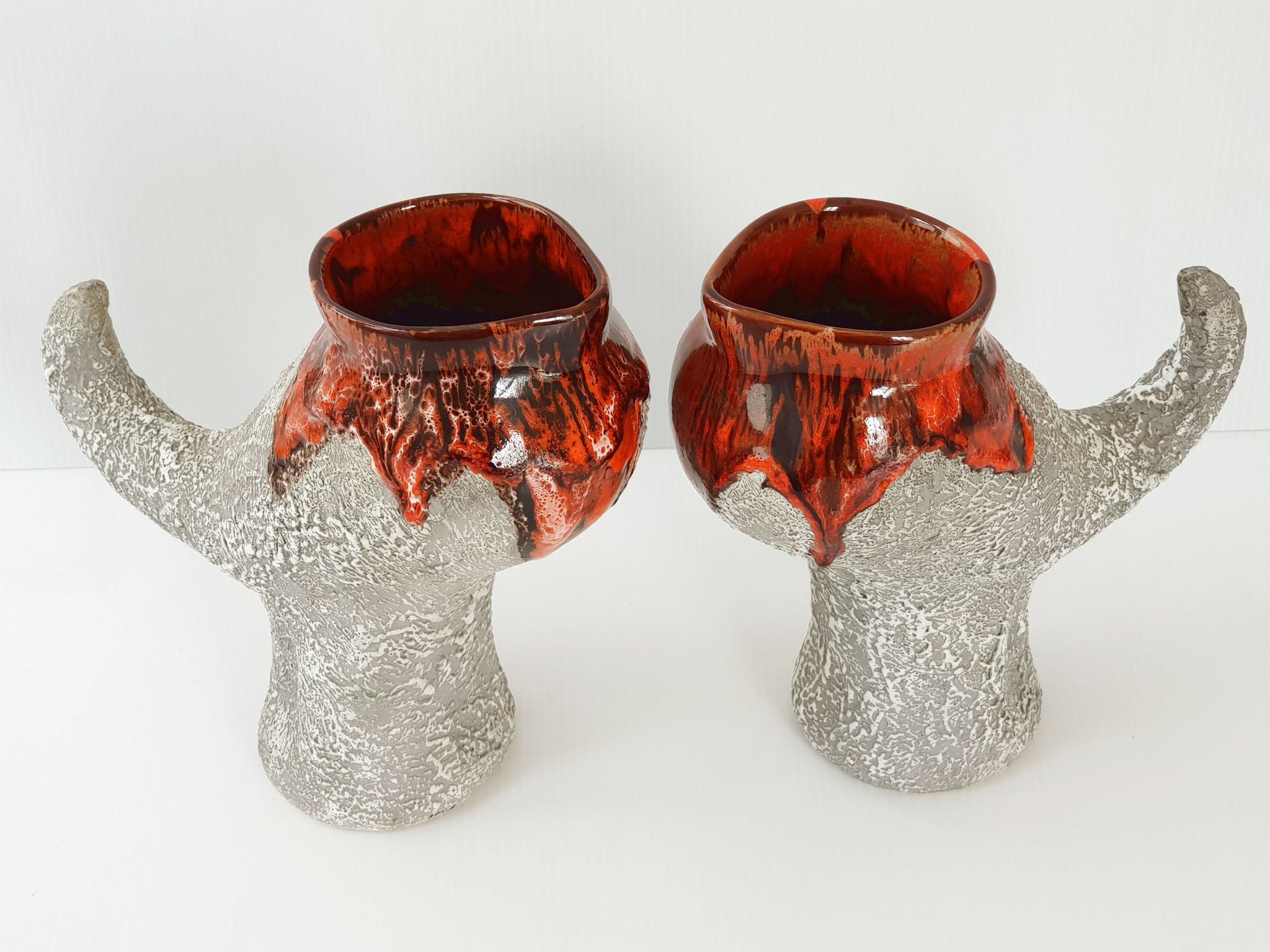 Pair of vintage zoomorphic pitchers