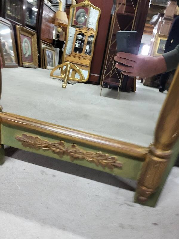 Empire style mirror in wood and gilding