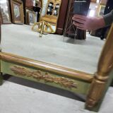Empire style mirror in wood and gilding
