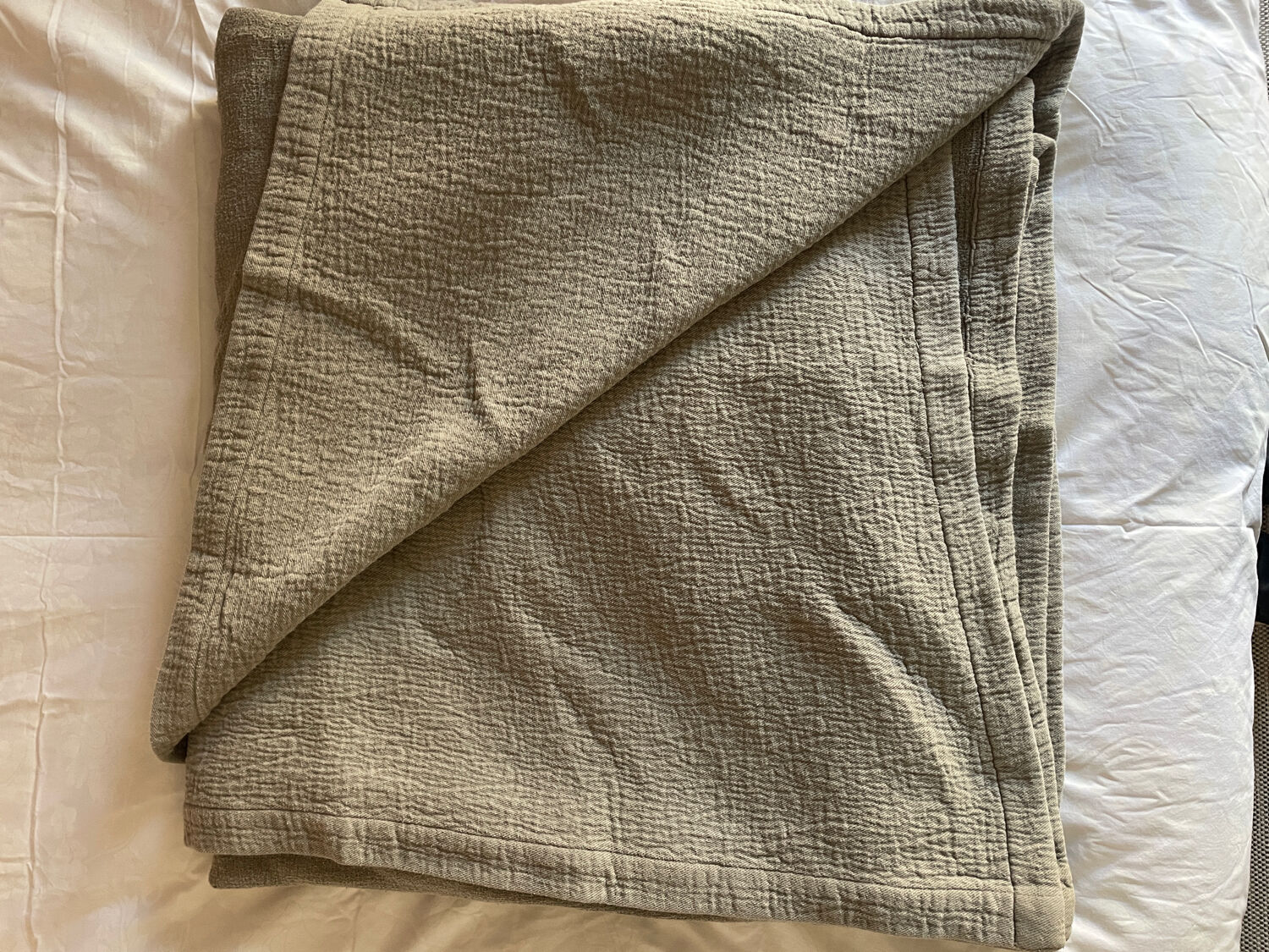 Almond-colored Caravan bedspread